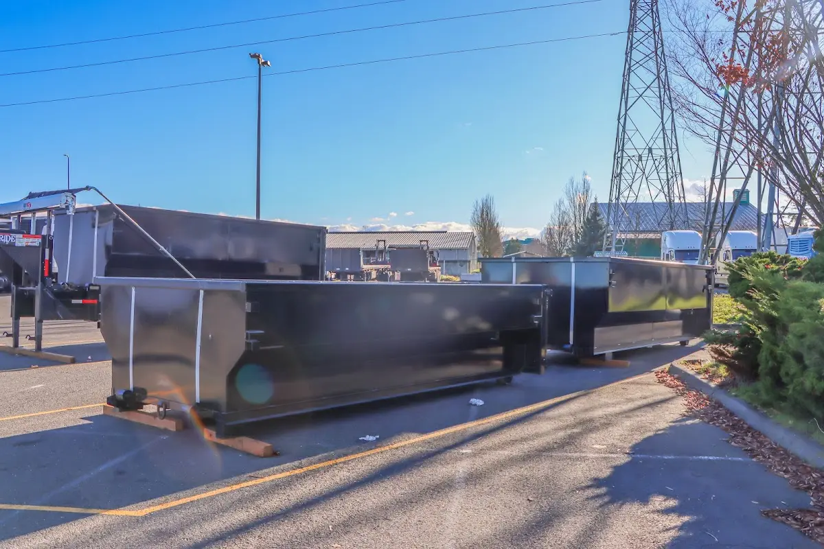 Roll-off dumpster ready for waste disposal at job site for 15 Yard Dumpster Rental in Farmers Branch